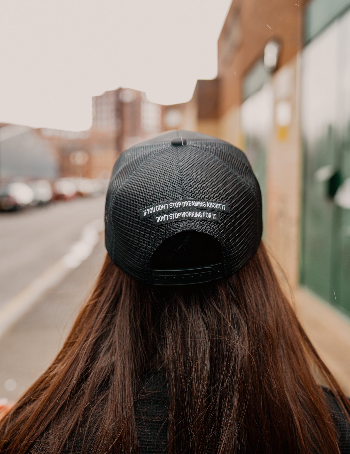 Black Honest Motion Trucker Hat